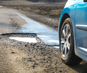 Read more about the article Why Should I Avoid Potholes On The Road?
